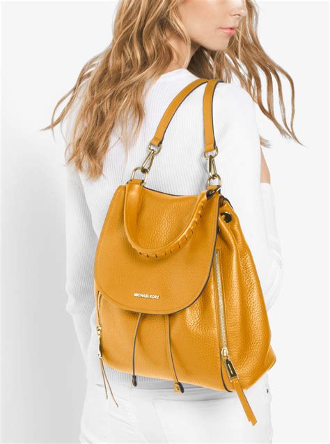 michael kors viv backpack marigold|viv leather backpack.